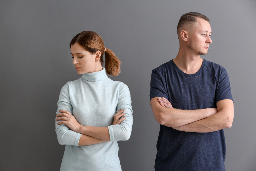 divorced couple looking away from each other