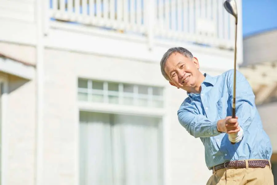 Older Gentleman Enjoying Retirement Golfing